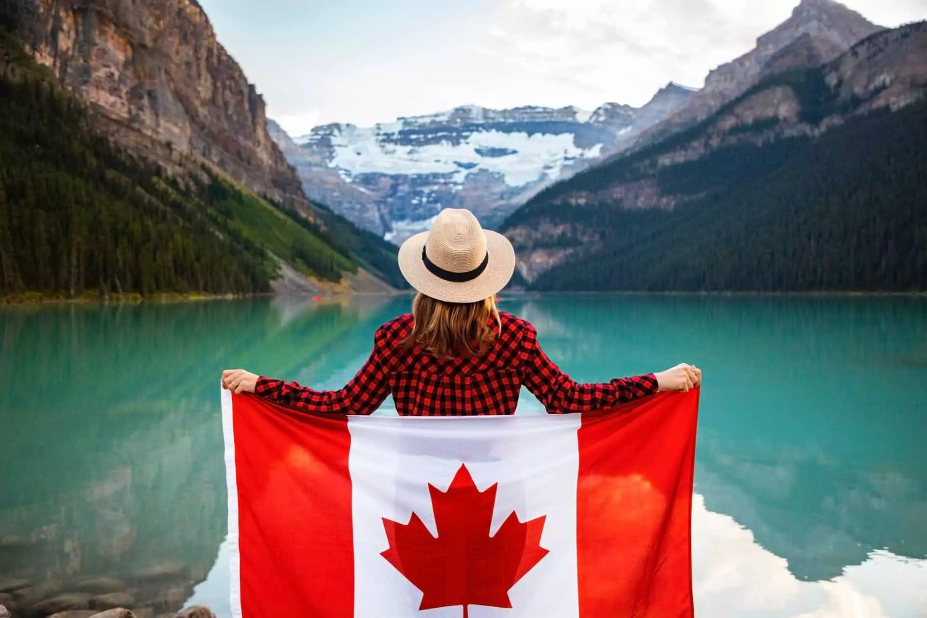 canada nature and canadian flag held by a woman I love veterinary