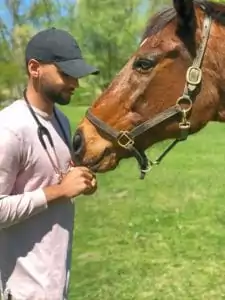 Aman Kanwar with horse - I Love Veterinary
