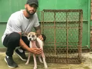 Aman Kanwar with dog saved from slaughterhouse in China - I Love Veterinary
